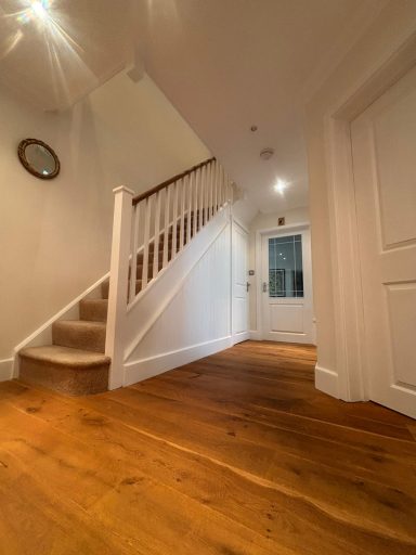 Freshly painted hallway by a female painter and decorator in Maidstone